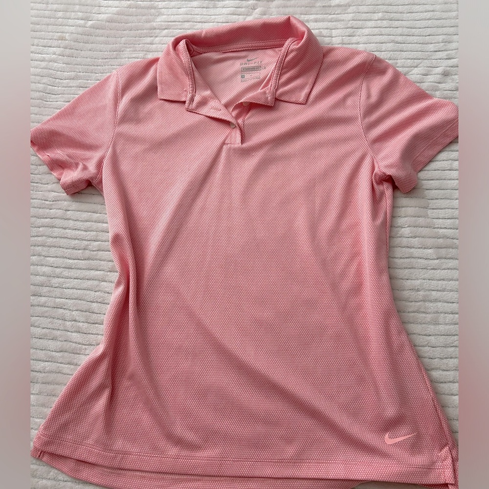 Pink Nike collared golf shirt